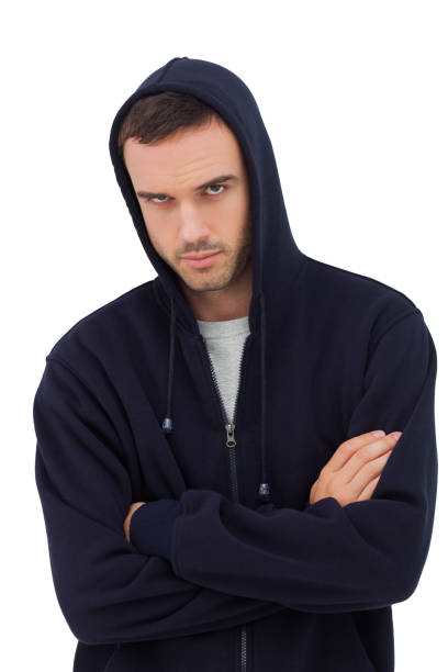 istock Attractive man with arms crossed looking angry 827793030