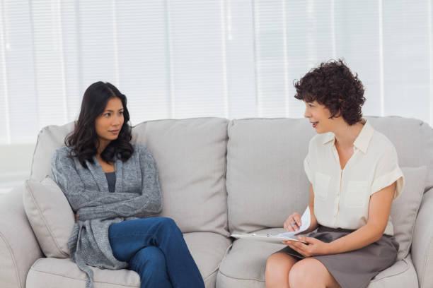 istock Therapist speaking to her patient 827793096