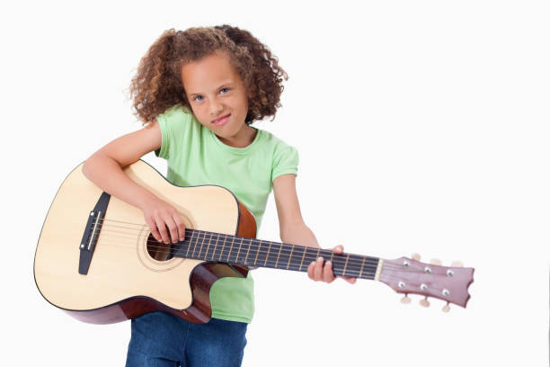 istock Girl playing the guitar 827799466