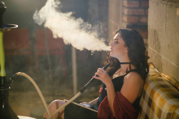 istock girl with hookah 827803278