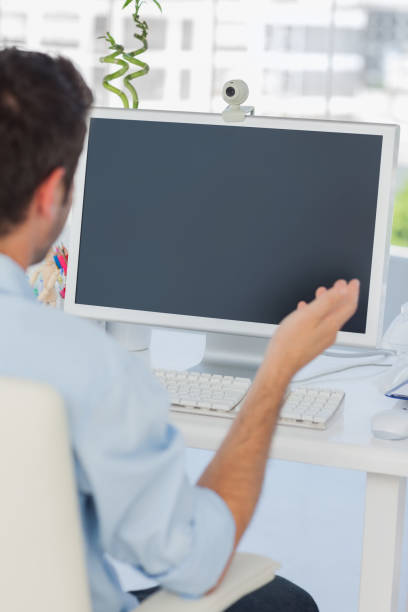 istock Designer having a video chat in his office 827804022