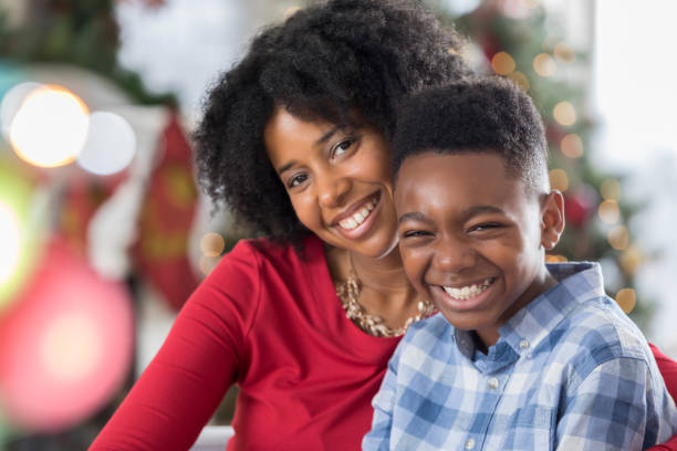 istock Single mom spends Christmas day with her adorable son 827810334