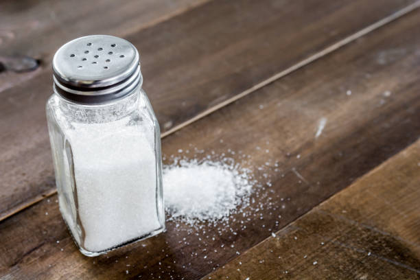 Salt in wooden table stock photo