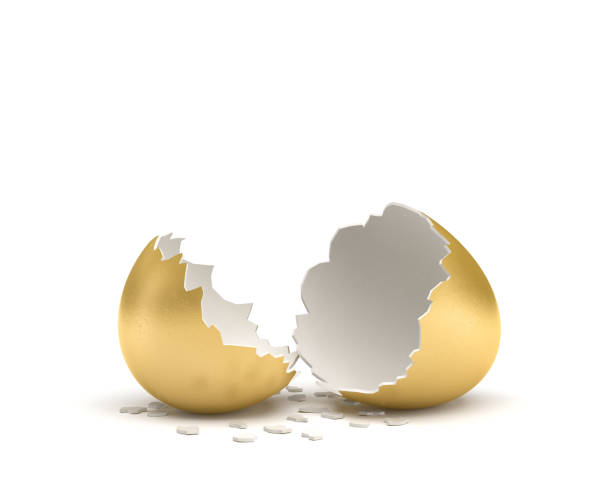 istock 3d rendering of a cracked golden egg with its two pieces lying beside each other on white background 827821824