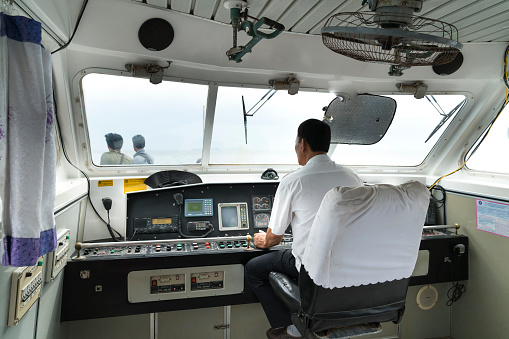 Ly Son Island, Quang Ngai Province, Vietnam - July 29, 2017: Inside the cockpit of a small passenger ship on the way to Ly Son Island