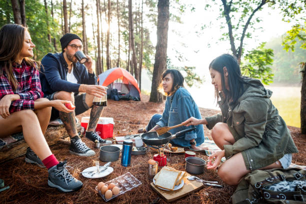 istock Friends Camping Eating Food Concept 827840660