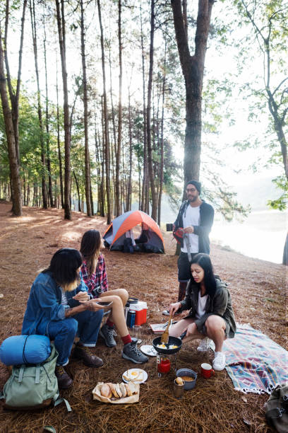 istock Friends Camping Eating Food Concept 827843820