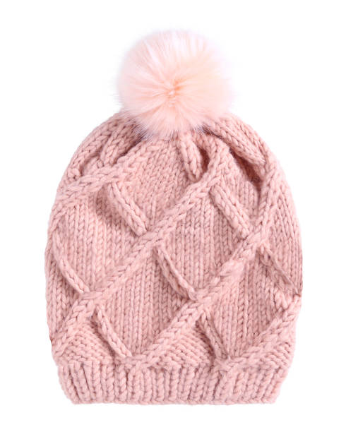 istock Pale pink winter knitted cap hat with a pom-pom isolated white 827847880