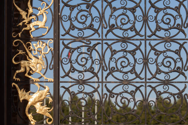 istock Antique iron gate in a stone wall Suyumbike tower in kazan kremlin 827848204