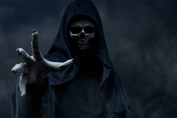 Grim Reaper Grim Reaper on dark background hell photos stock pictures, royalty-free photos & images