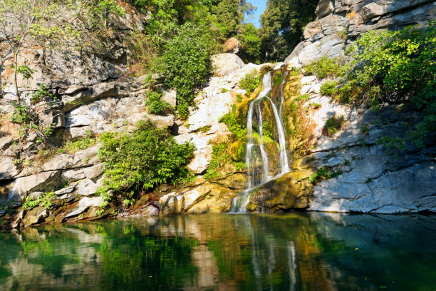 istock waterfall in Corsica mountain 827848508