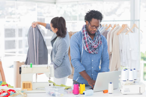 istock Fashion designer working on laptop 827850556