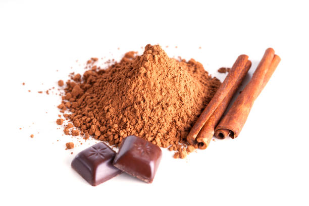 istock Chocolate pieces, cacao powder and cinnamon 827850866