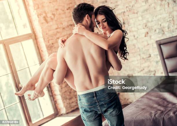 Sexy Young Couple Stock Photo - Download Image Now - Sensuality, Embracing, Women