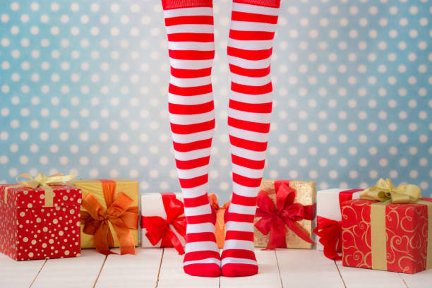 istock Sexy Santa woman legs 827867064