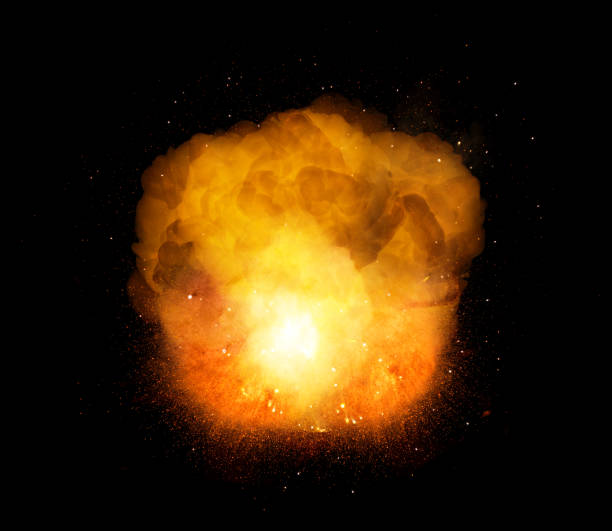 Huge, extremely hot explosion with sparks and hot smoke, against black background stock photo