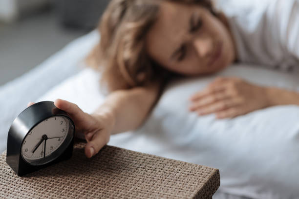 istock Selective focus of a small ringing alarm clock 827875062