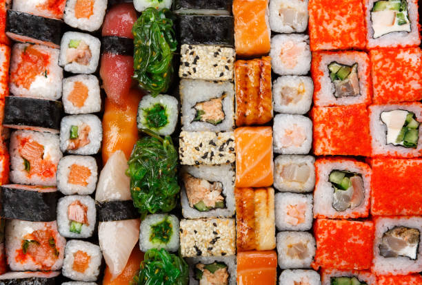 istock Set of sushi, maki and rolls isolated on white background 827881134