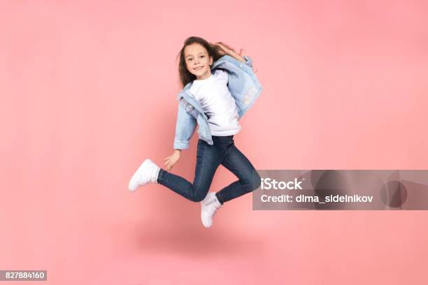 Young Girl Teen Youth Trends Studio Portrait Stock Photo - Download Image Now - Child, Jumping, Clothing