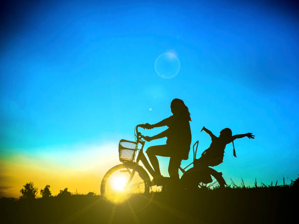 Biker family silhouette father and daughter