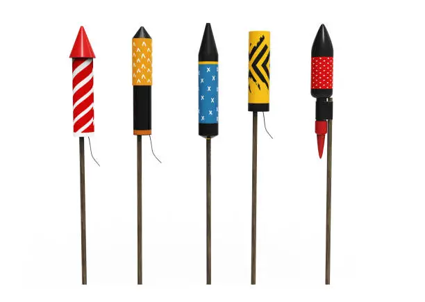 Group of fireworks rockets, isolated on white background. Concept of celebration and New Years Eve. 3D render of rockets.
