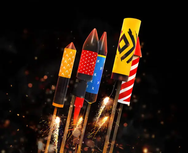 Group of fireworks rockets launching, isolated on black background. Concept of celebration and New Years Eve. 3D render of rockets.