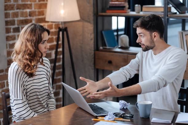 istock Unhappy angry man pointing at the laptop 827896414