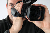 kameramann-aufnahmen-mit-videokamera.jpg?b=1&s=170x170&k=20&c=IDf8xmw-uP6B9HWqpPZTYNWpeGf_2E51P1G8IDl3iWo=