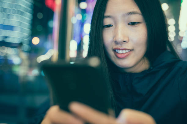 istock Woman using mobile phone in cafe 827900816