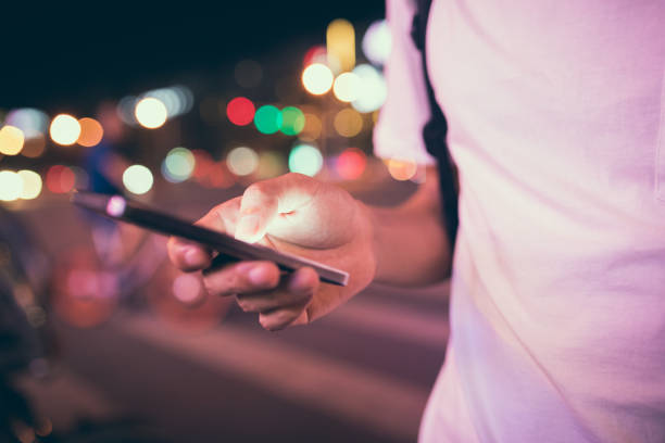 istock Man using his mobile phone in the street 827901454