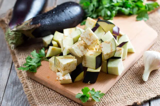 Photo of Eggplant cubes on a cutting board