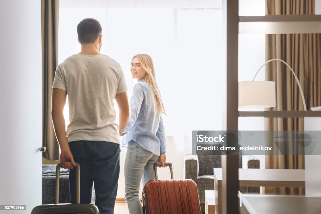 Young couple travel together hotel room leisure Young man and woman together tourism hotel arrival Hotel Stock Photo