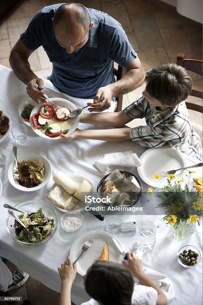 family having typcaly italian meal  Family Stock Photo