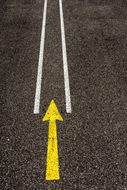 istock yellow arrow street sign 827914094
