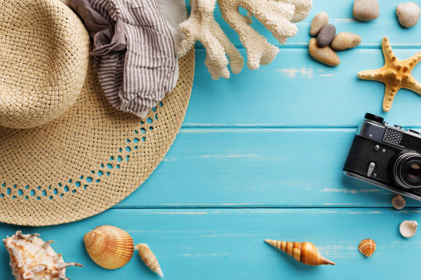 istock Vacation background on blue wood, top view with copy space 827914652