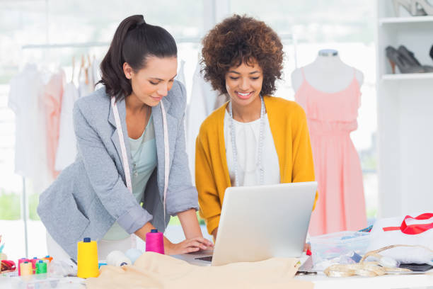 istock Fashion designers working on a laptop 827921236