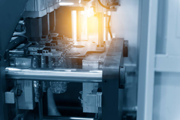 istock The operation of PET bottle or plastic bottle  blowing machine 827929536