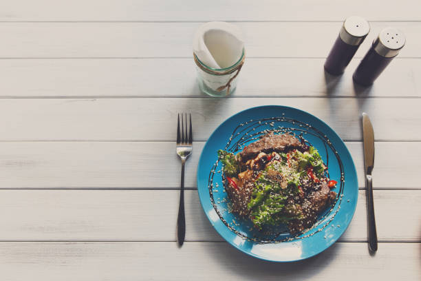 istock Restaurant food, warm meat salad top view 827932992