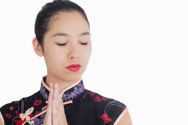 istock Geisha style woman closing her eyes 827935042