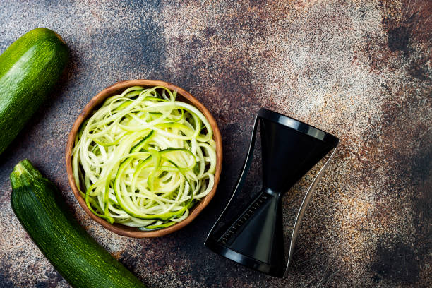 istock Zucchini spaghetti or noodles (zoodles) bowl. Top view, copy space 827947052