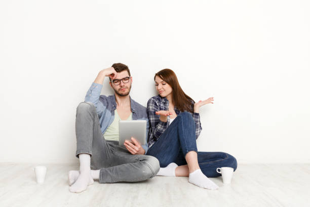 istock Couple shopping online on digital tablet 827947528