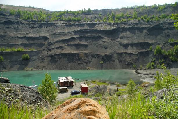 Abandoned quarry for coal mining in the Kemerovo region stock photo