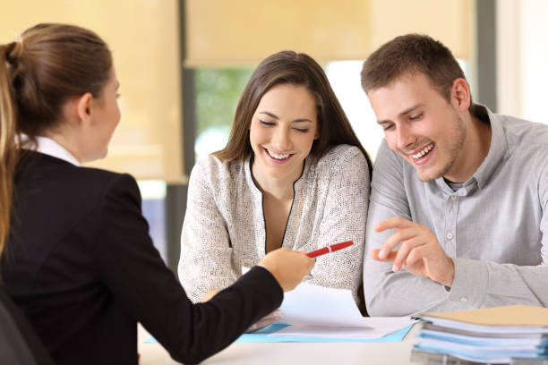 customers ready to sign a contract at office - house pen people caucasian imagens e fotografias de stock