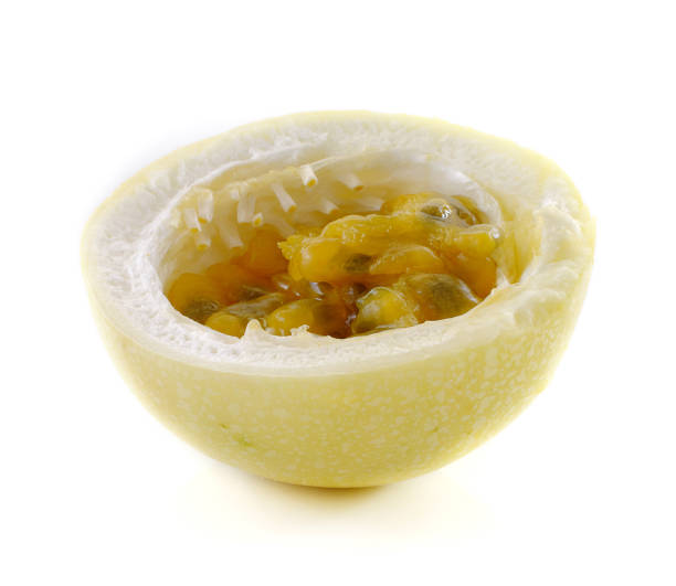istock passion fruits isolated on white background 827954910