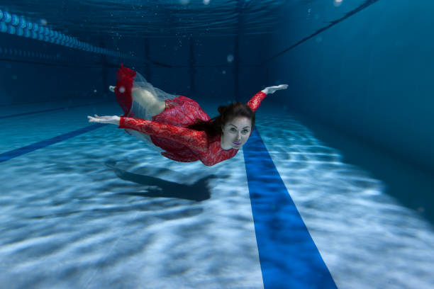 istock Swimmer underwater in the pool. 827958052