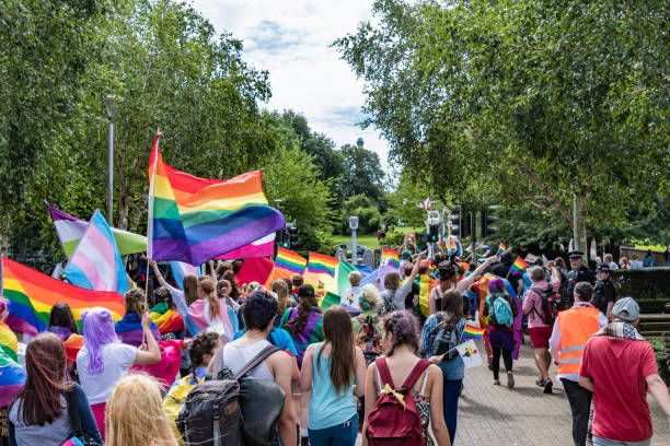 Gay Pride Parade passes with lots of flags at Plymouth Pride 2017, an LGBT festival.