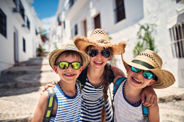 istock Kids visiting andalusian white village 827962944
