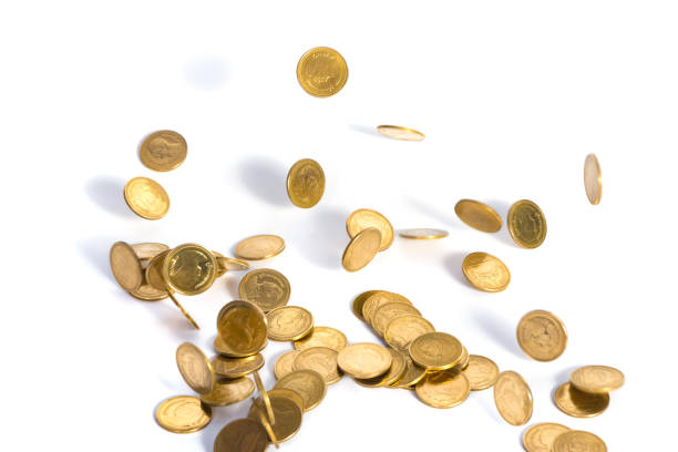 istock Falling gold coins. Money on a white background. shallow focus. 827963472
