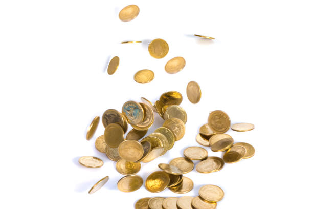 istock Falling gold coins. Money on a white background. shallow focus. 827963480