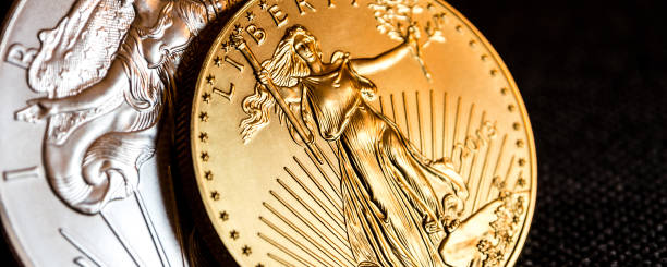 istock silver eagle and golden american eagle one ounce coins 827963652